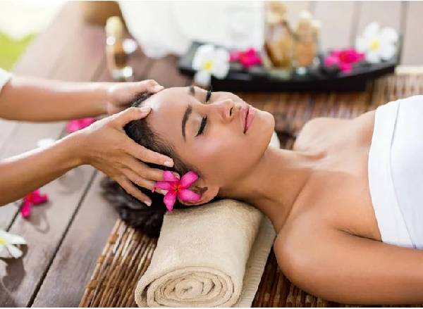 Image of A Girl Taken Head Massage in Luxurious Massage Center